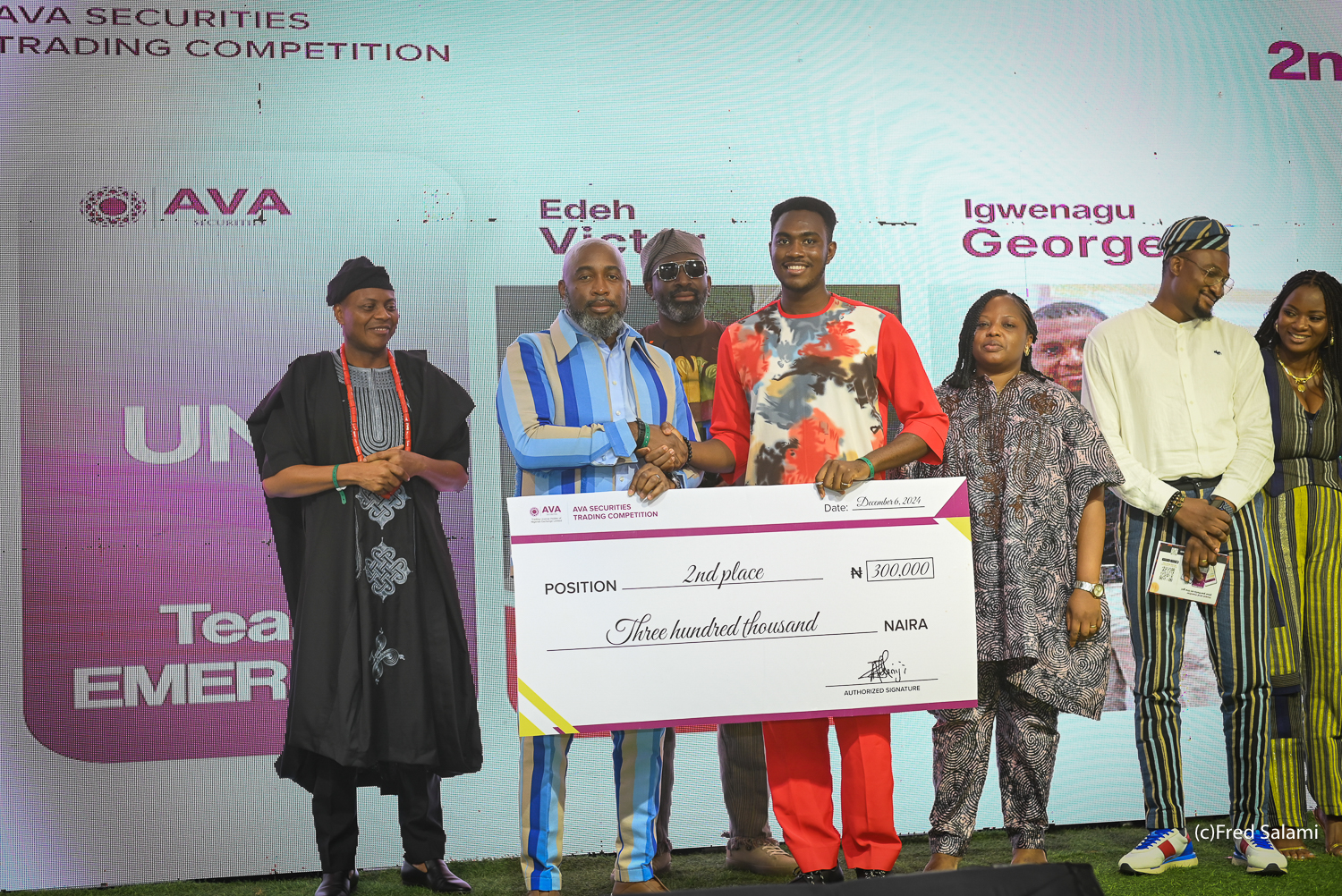 2nd place winner receiving cheque